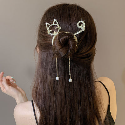 Rhinestone hairpin pearl bun artifact