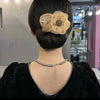 Mesh flower hair curler with diamond bun