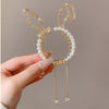 Rhinestone hairpin pearl bun artifact