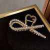 Half bow pearl hair clip