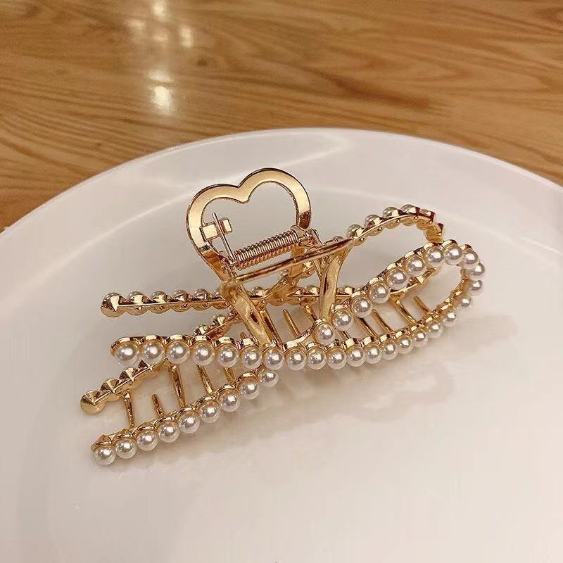 Half bow pearl hair clip